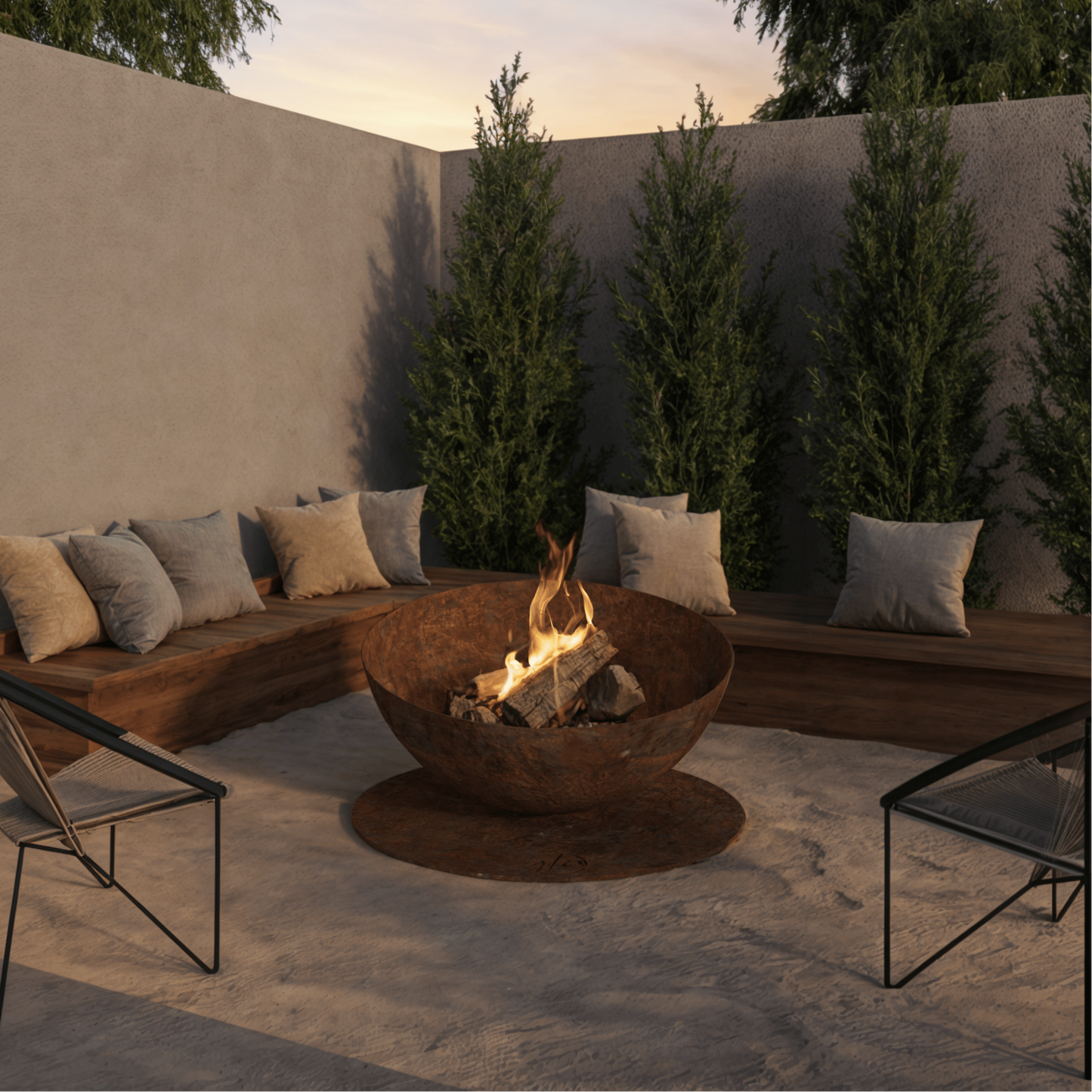 Outdoor patio with a fire pit, seating area, and trees in the background.