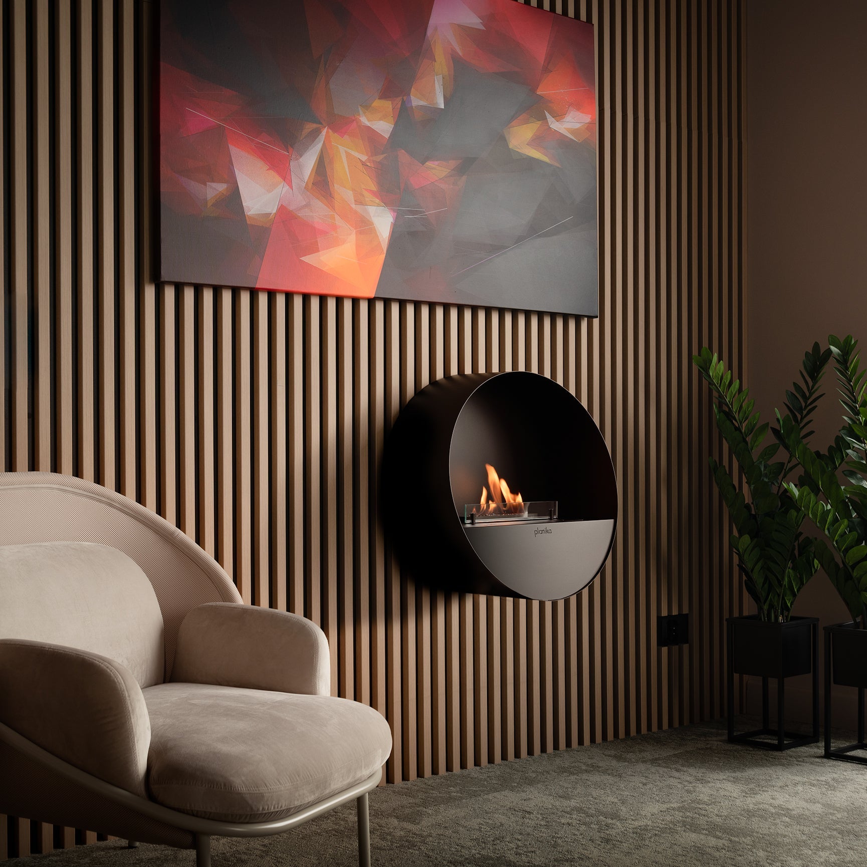 Modern living room with a wall-mounted fireplace, beige armchairs, and a colorful abstract painting.