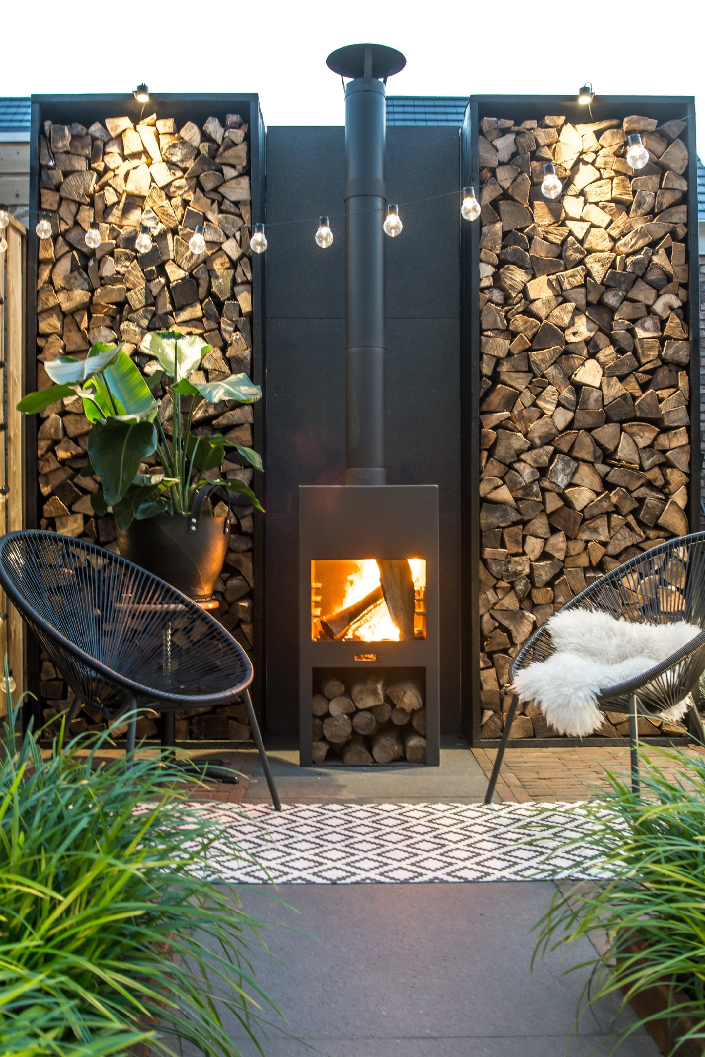 Adezz Stig Outdoor Fireplace With Wood Compartment | Coated or Corten Steel